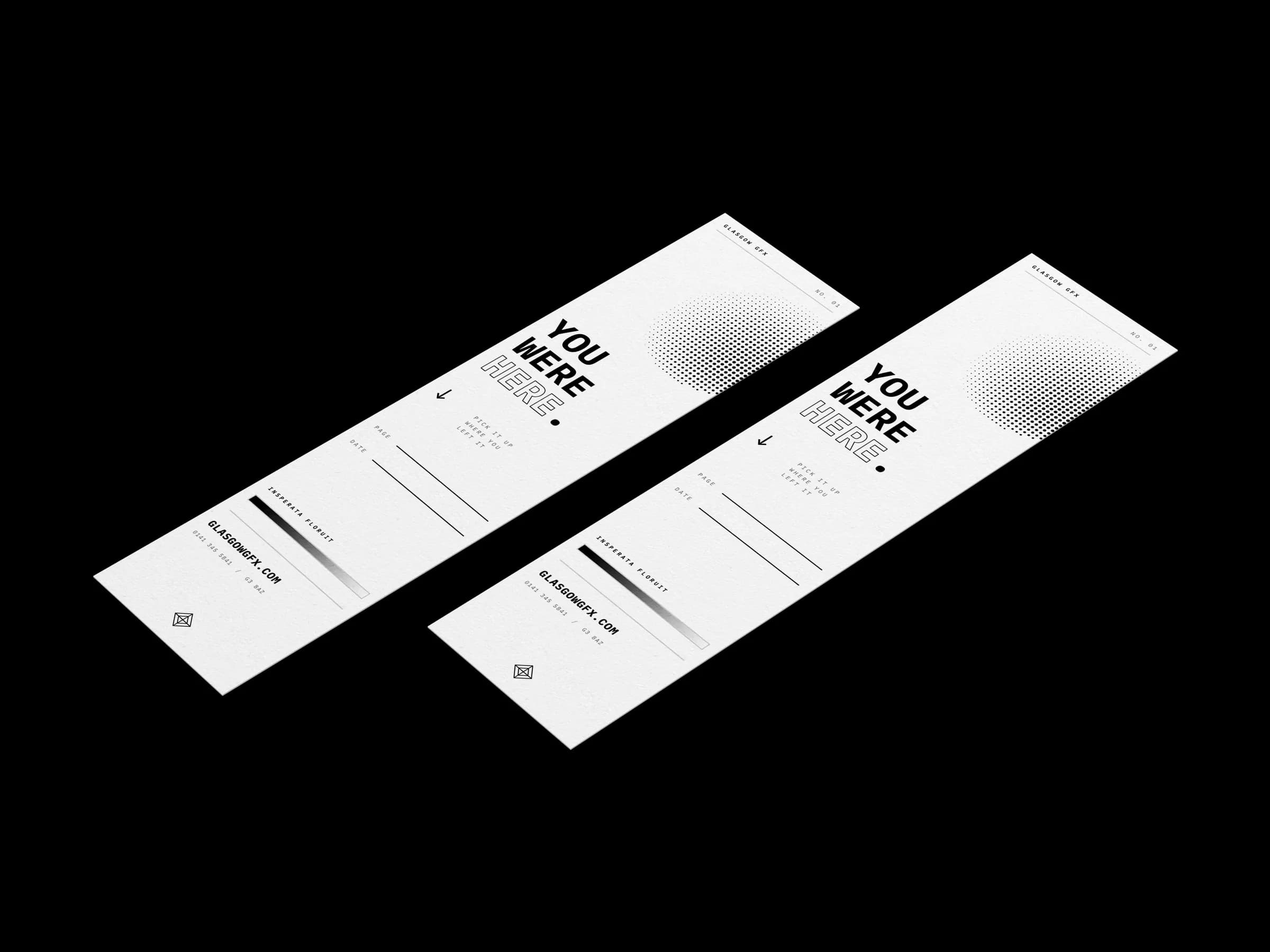 Two printed 50x200mm bookmarks reading 'You were here.' on a white studio surface