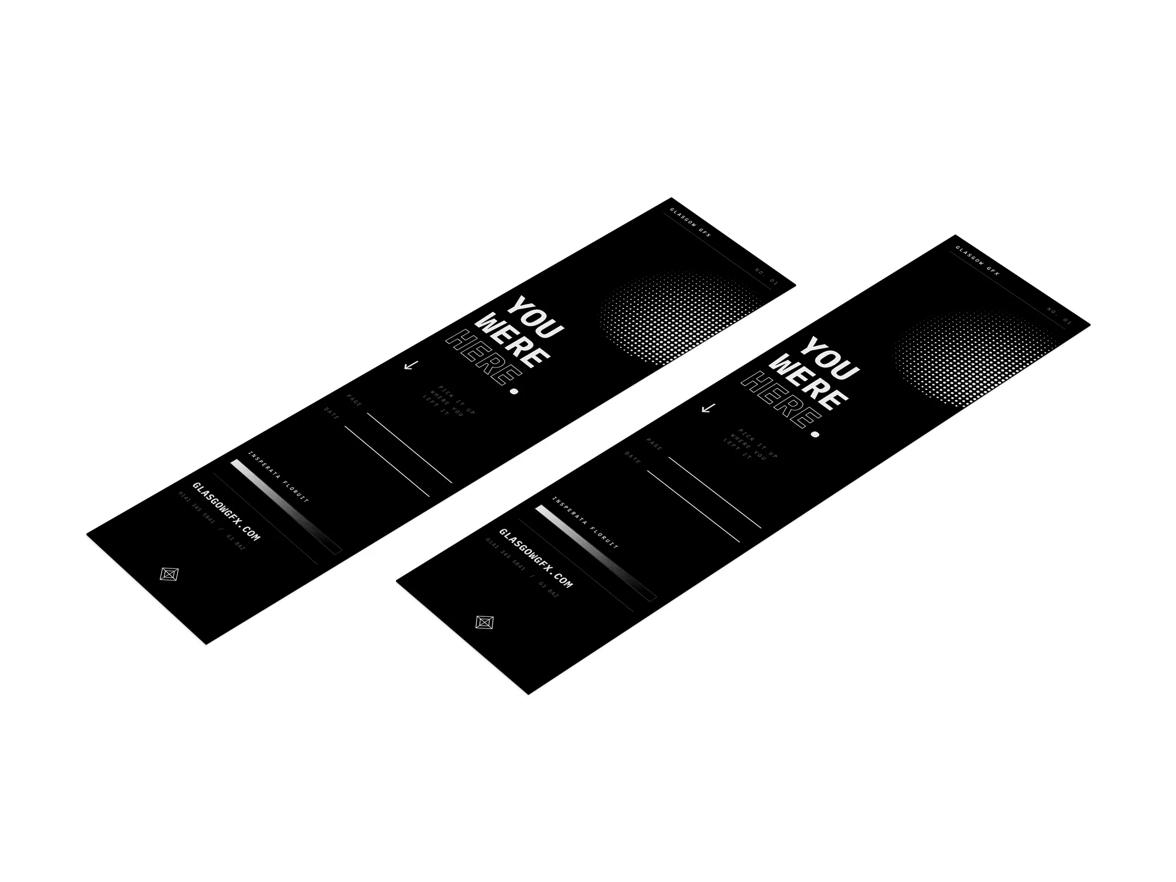 Two printed 50x200mm bookmarks reading 'You were here.' on a white studio surface