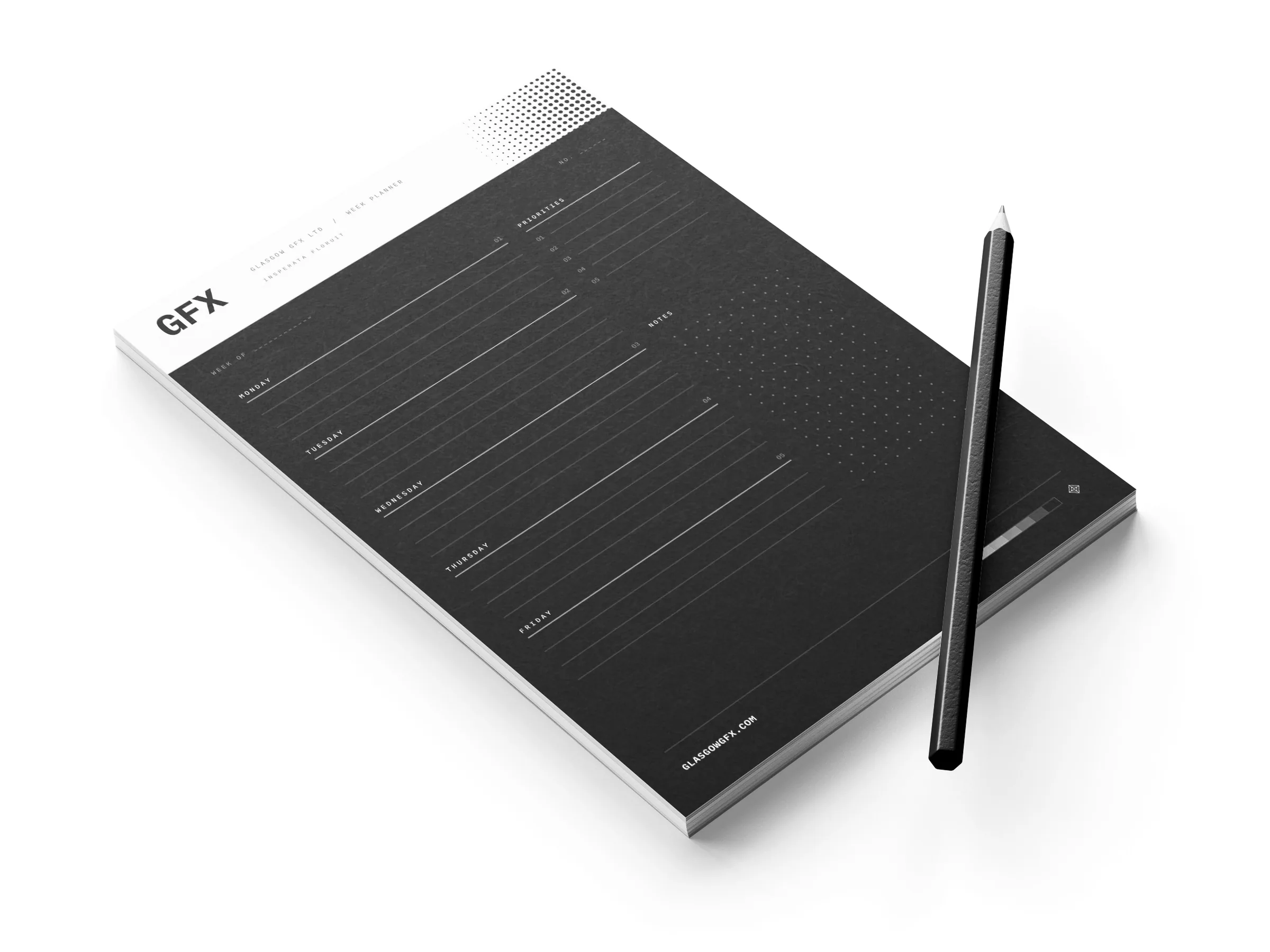 A4 week-planner desk pad with a pencil on a white studio surface