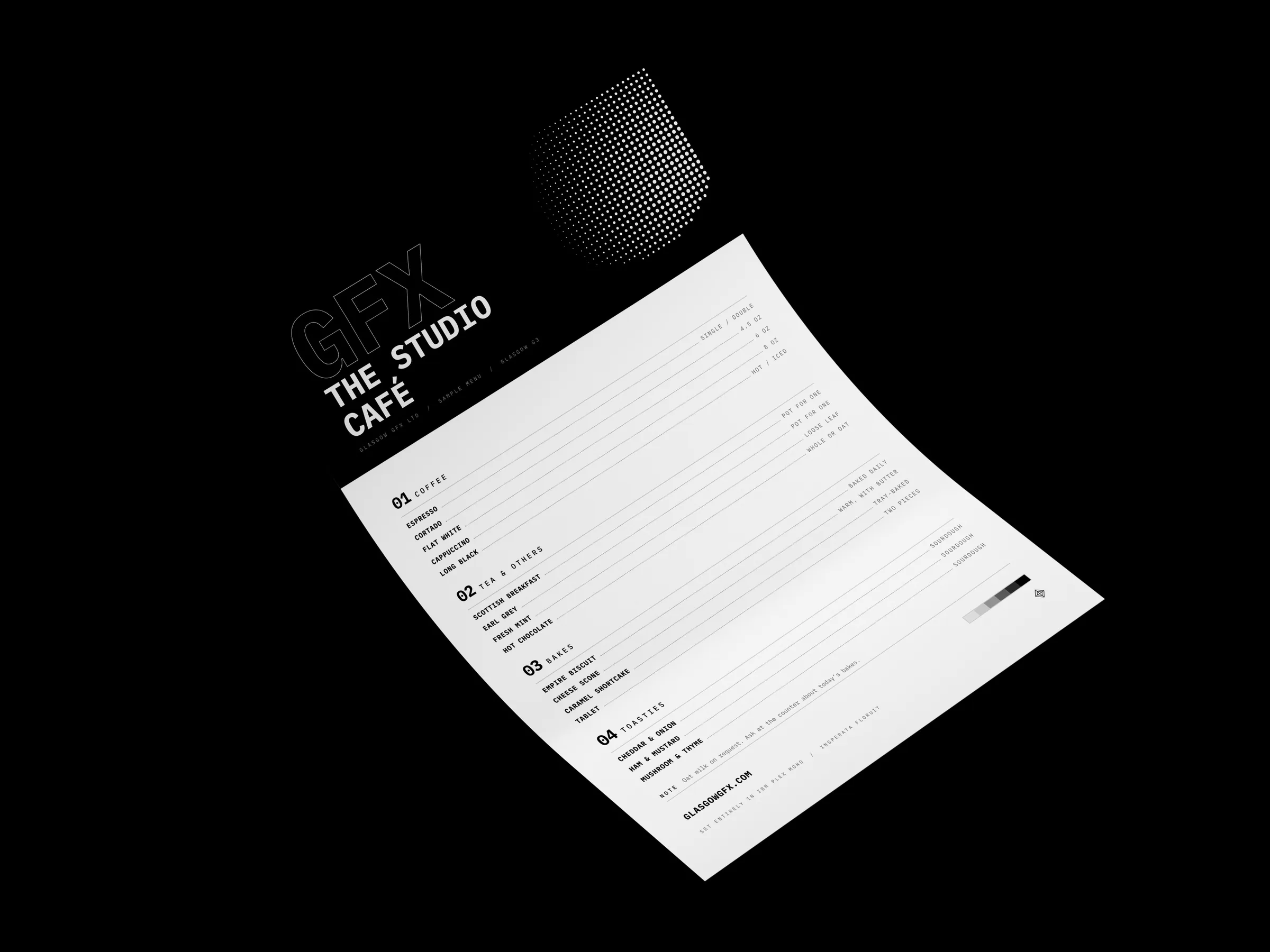 A4 flat café menu printed in black and white on a white studio surface