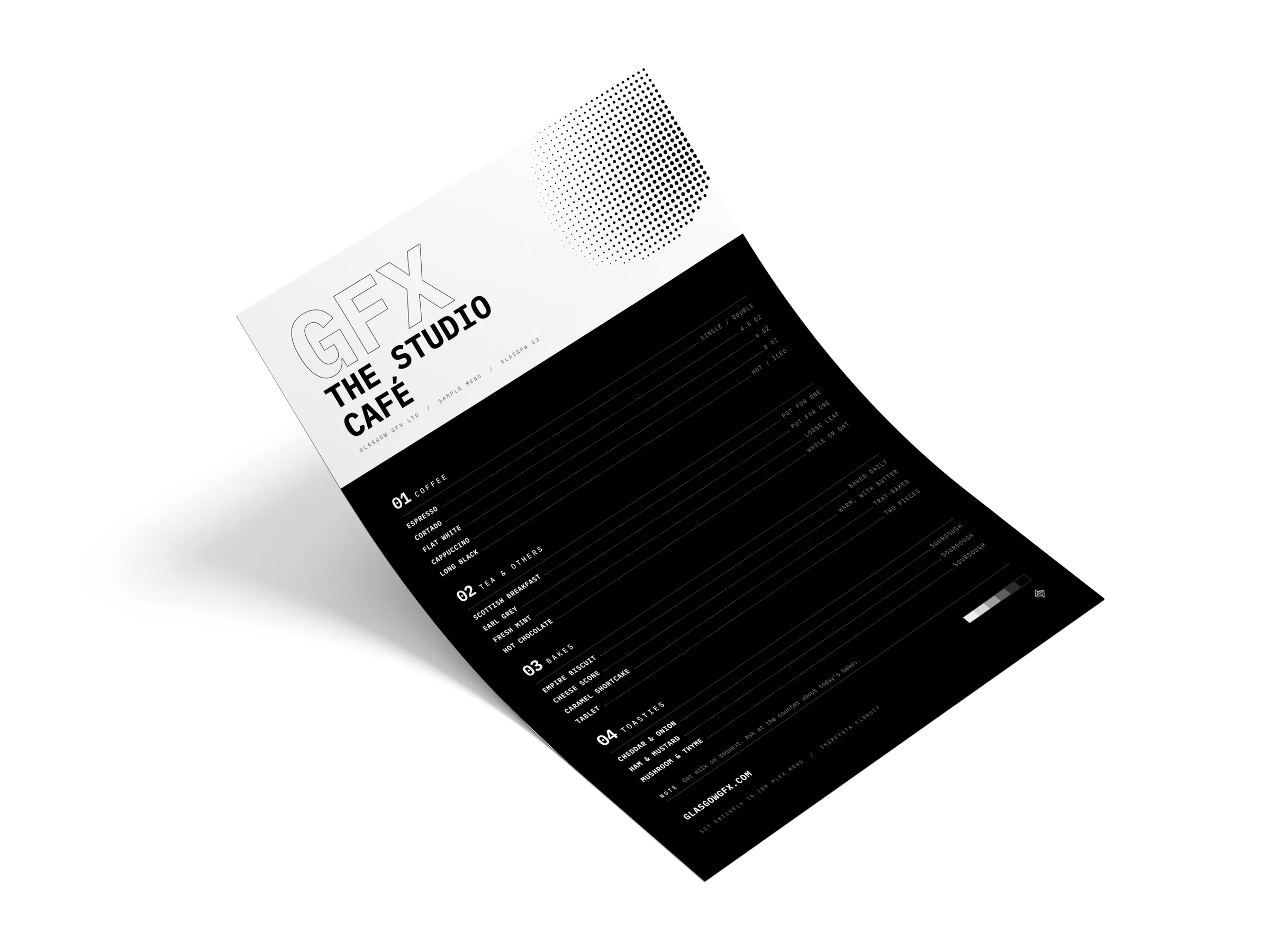 A4 flat café menu printed in black and white on a white studio surface
