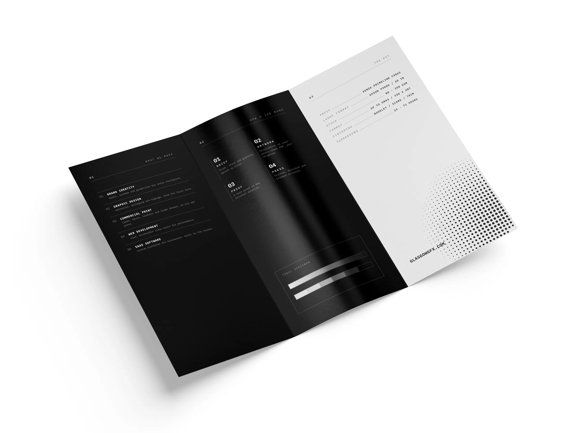 Open DL trifold leaflet showing the inside panels on a white studio surface