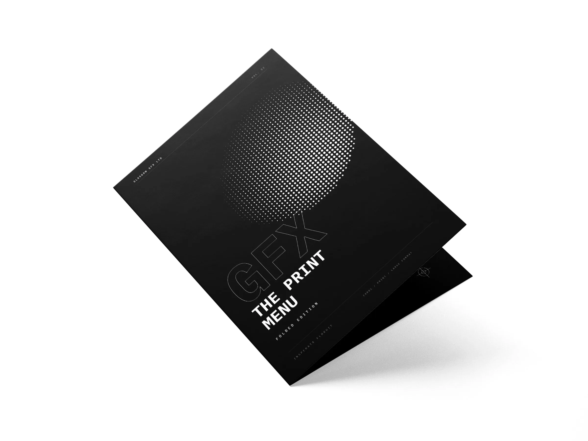 Folded A4 print menu standing part-open, cover facing, on a white studio surface