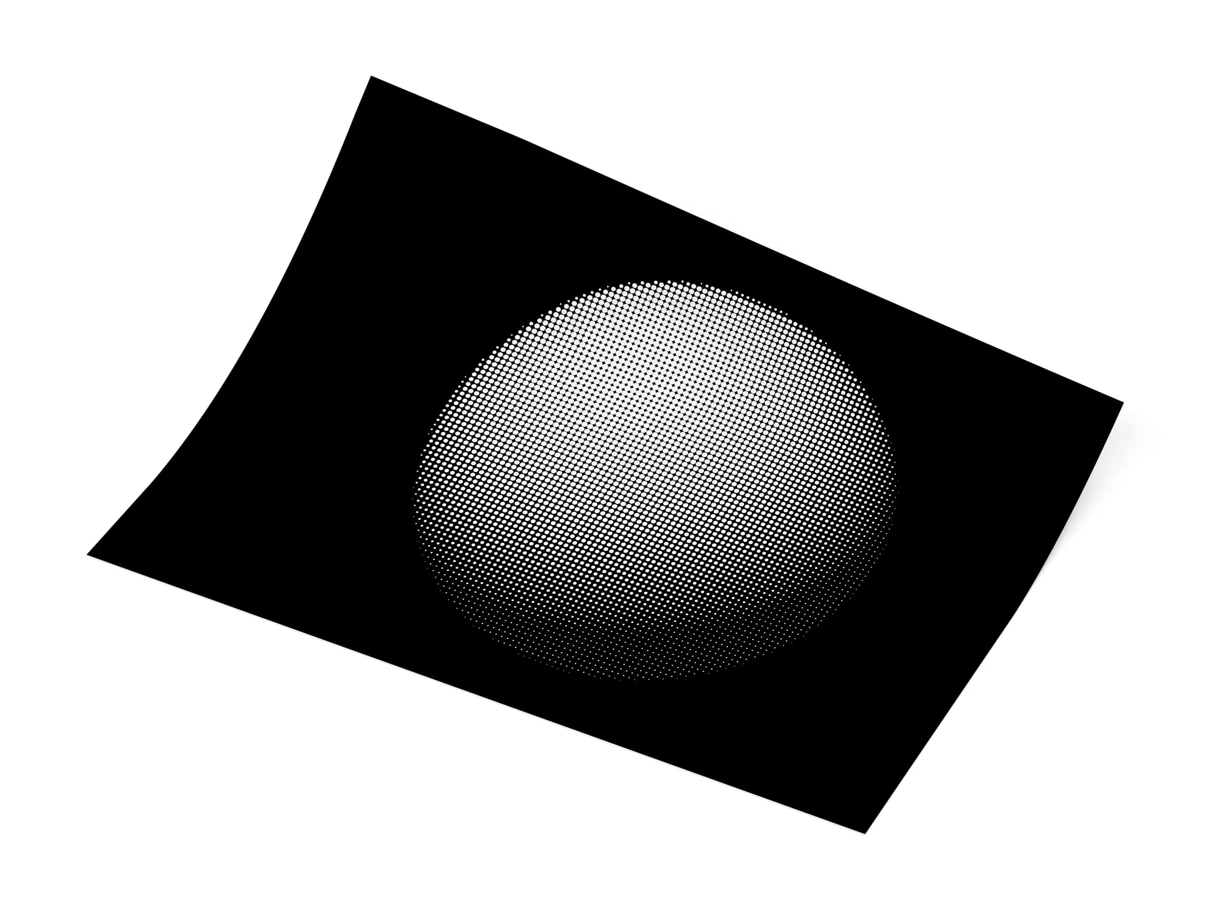 Giclée print of a halftone sphere artwork on a white studio surface