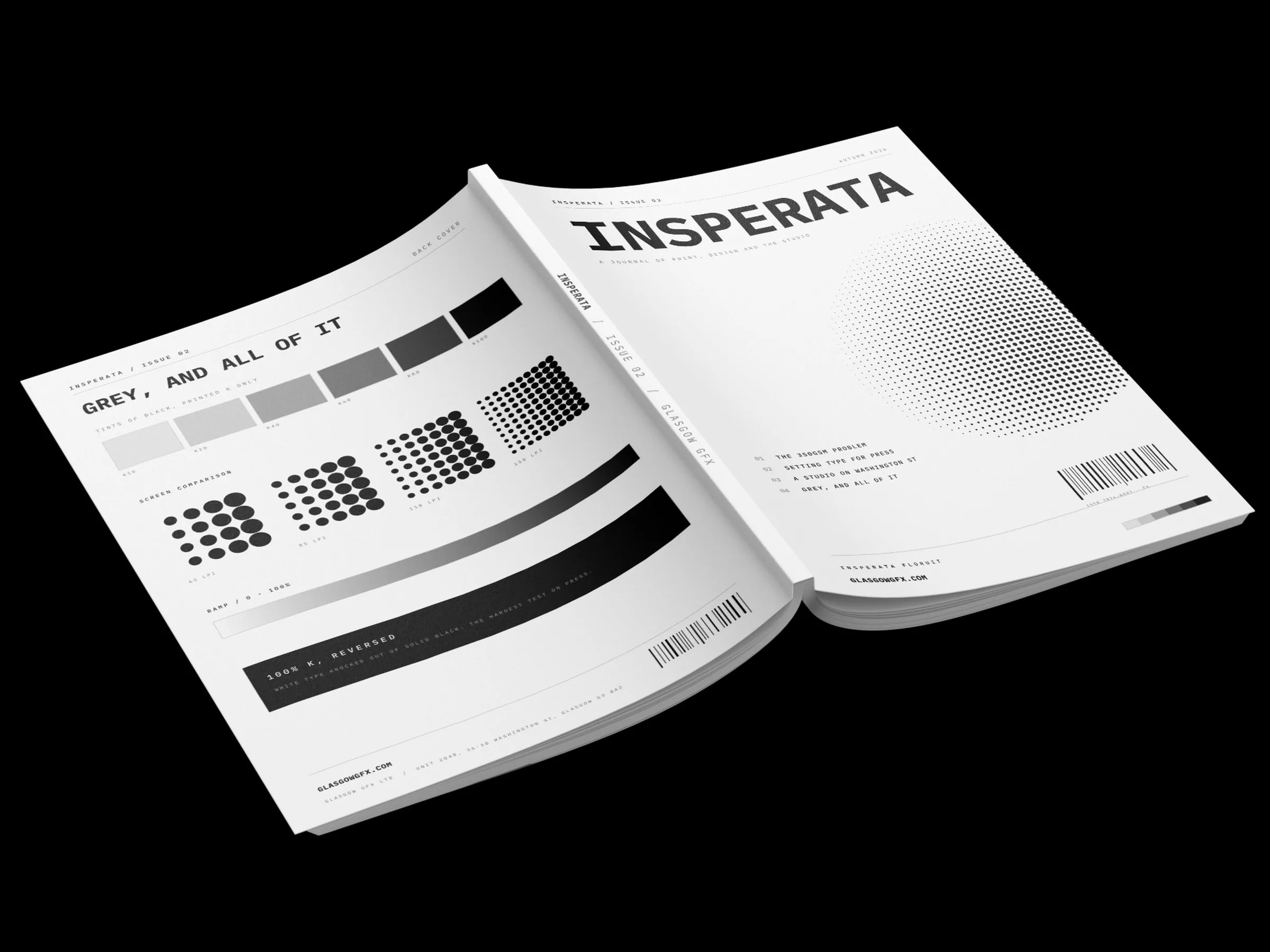 Perfect-bound A4 journal lying open on a white studio surface, front and back covers visible