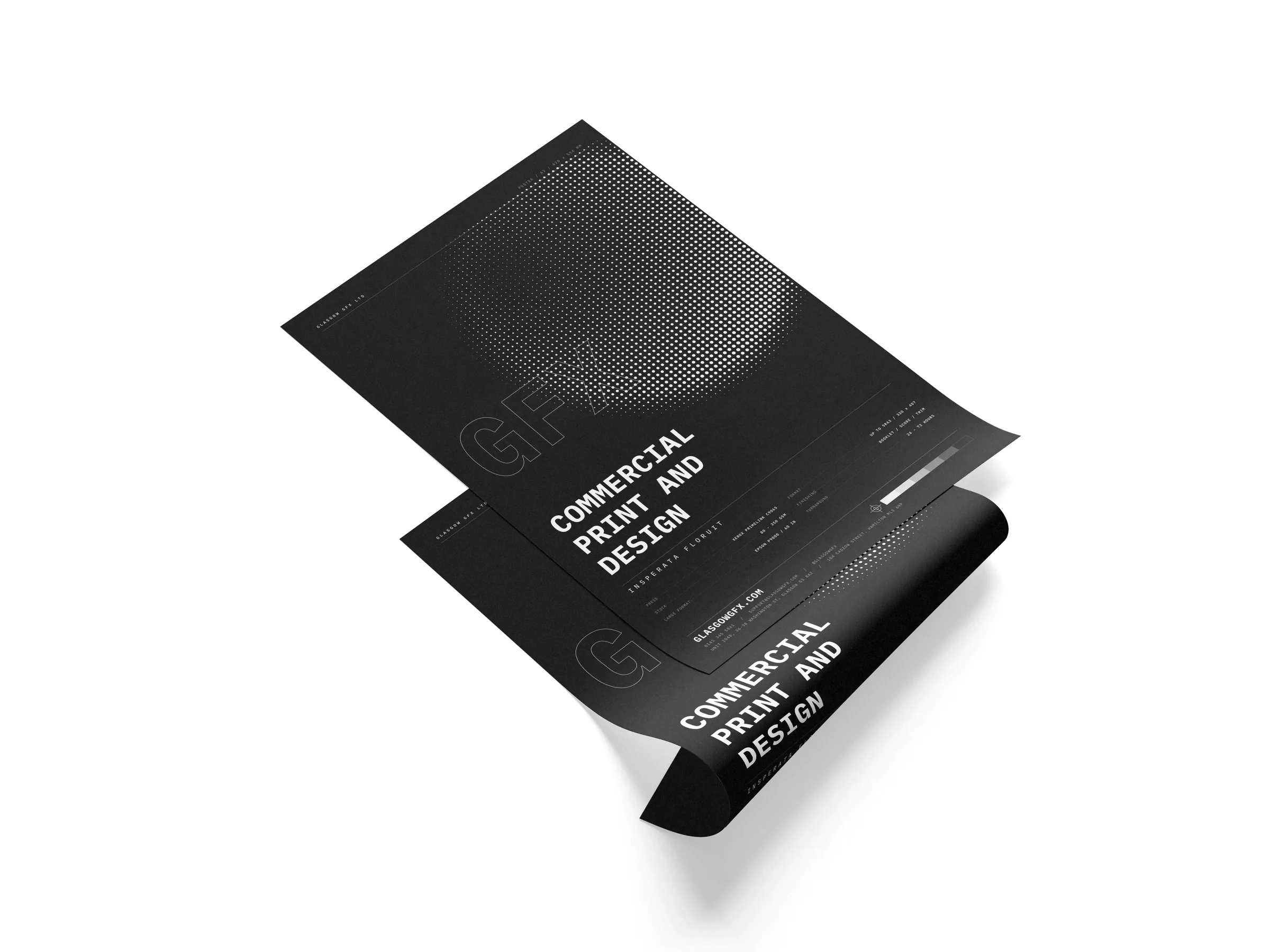 A2 poster with a curled sheet on a white studio surface