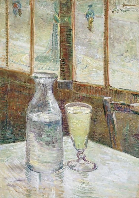 Café table with absinth as a canvas print