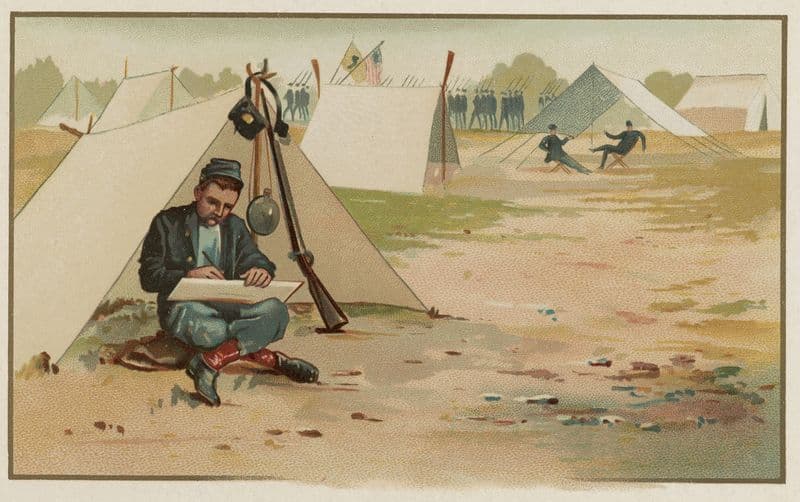 Union soldier making a drawing while sitting in front of tent at army camp as a canvas print